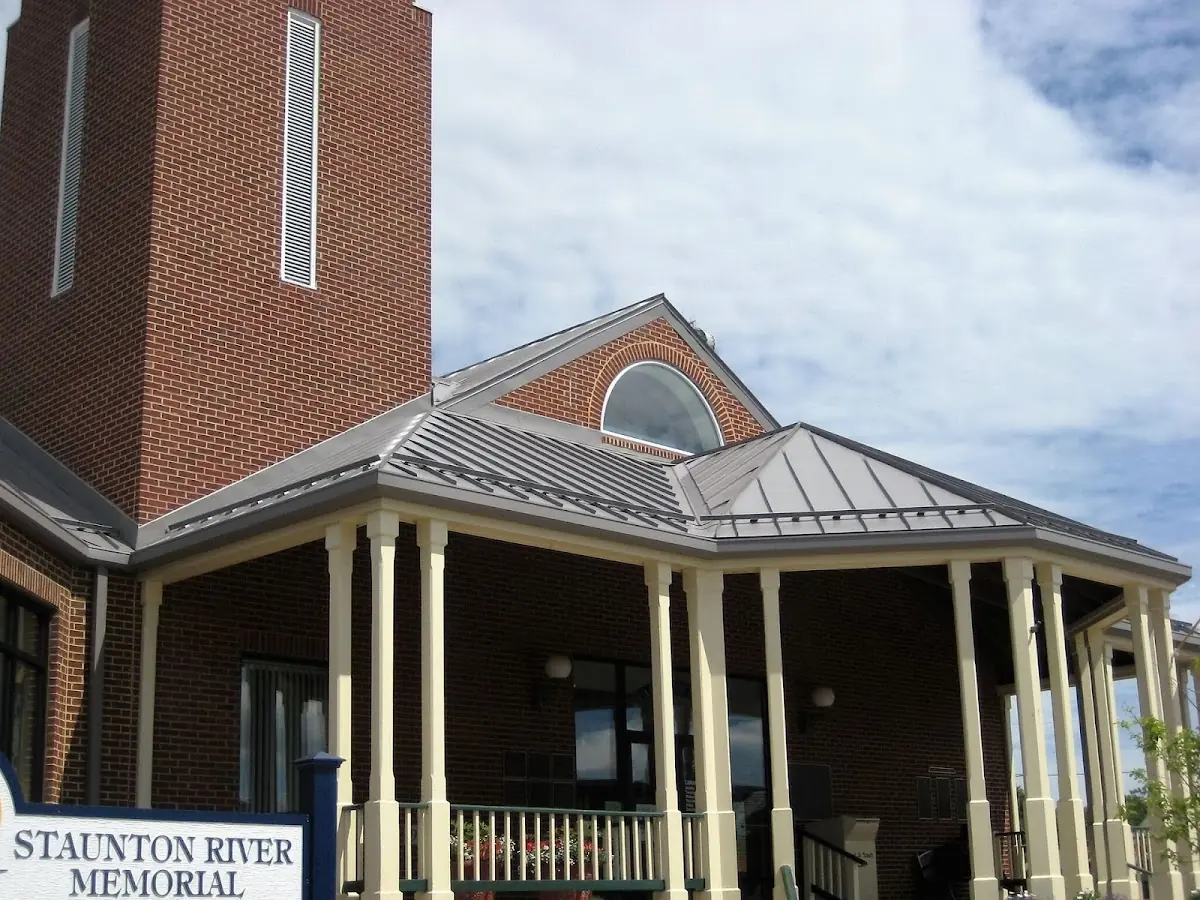 Skilled roofing craftsmen working on a residential roof in Cordele